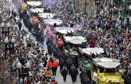 A rolling rally made its way through the streets of Boston in February 2005. More than 40 players from the Patriots? first three championship team are part of the lawsuit.
